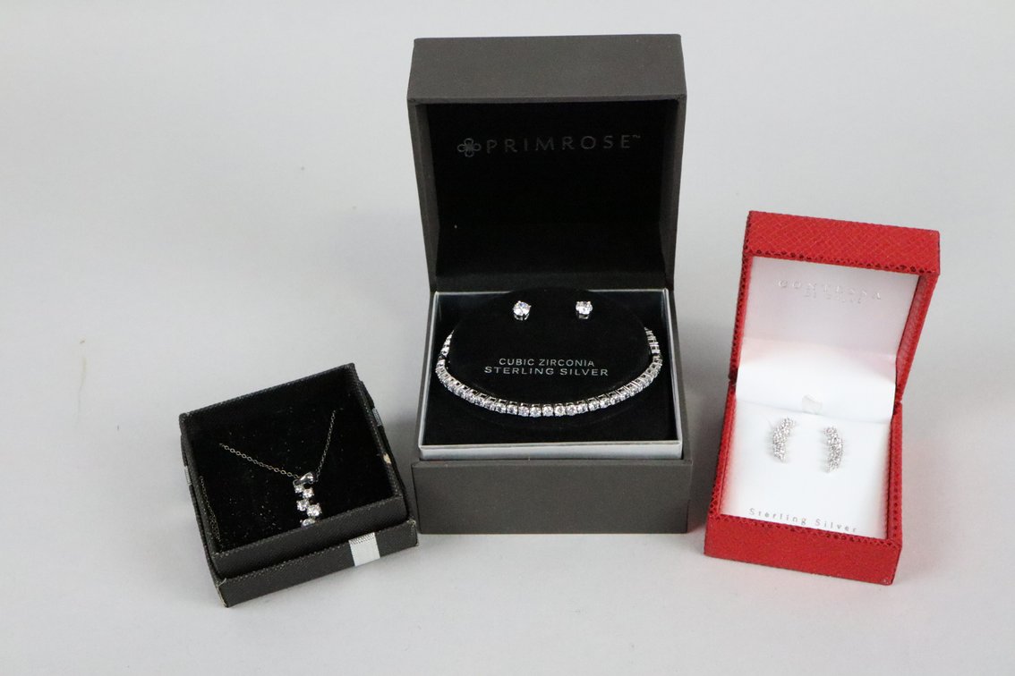 SS cz tennis bracelet with stud earrings, SS with white stones earrings, SS with white stones pendant on chain