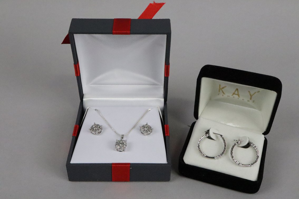 SS diamond cluster pendant with matching stud earrings, silver hoops with 'diamond' looking detail