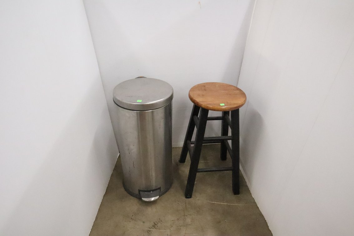 Barstool and Trash Can