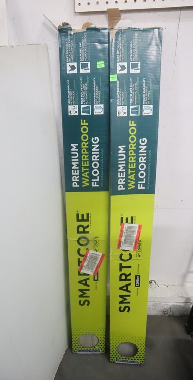 2 Mostly Full Packs of Smartcore Flooring