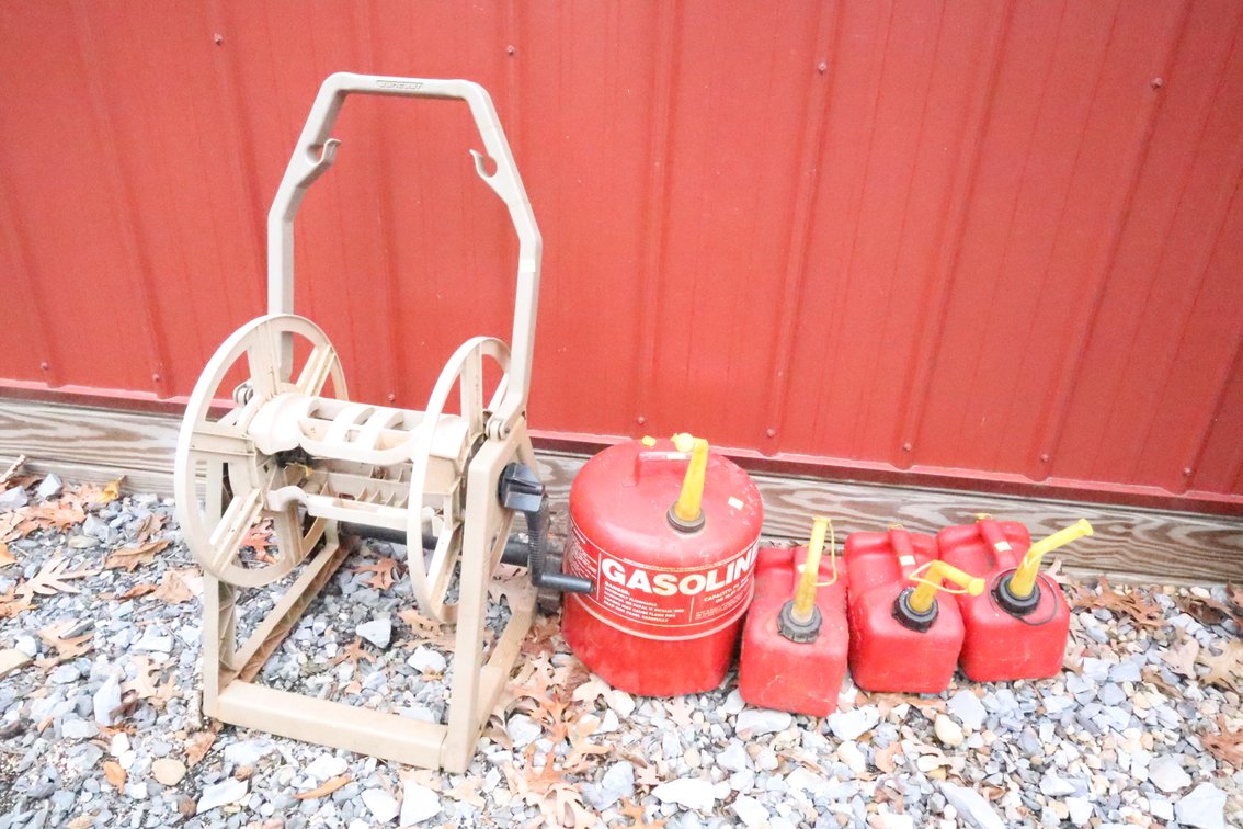 Group of Gas Cans, Hose Reel