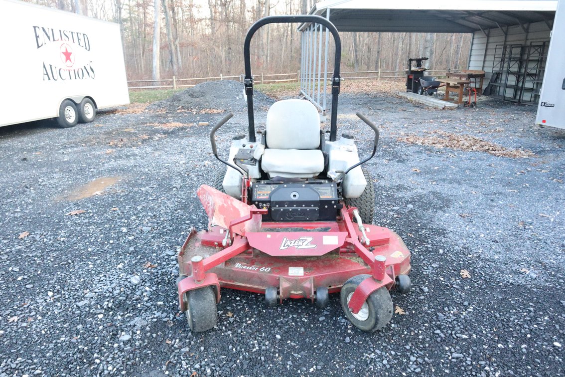 ExMark Lazer Z Zero Turn Mower, Mower Deck Needs New Spindle Pulley, 1057 Hours On Meter, Engine Could Use A Tune Up, Mower Does Start and Run