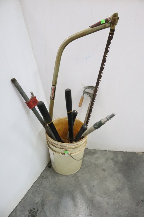 Bucket With Pruners, Bar Clamps, Bow Saw