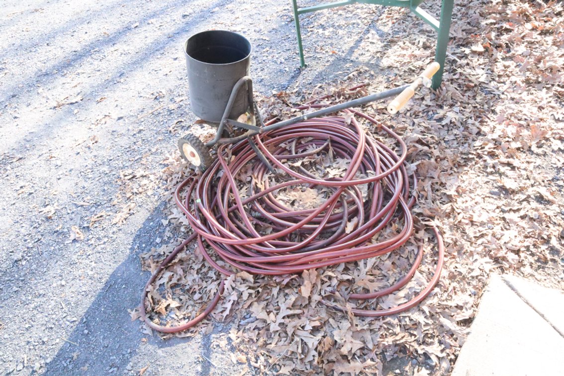Garden Hose and Broadcast Spreader