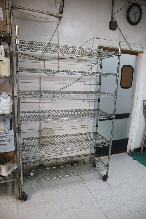 Metal Shelf With Casters.