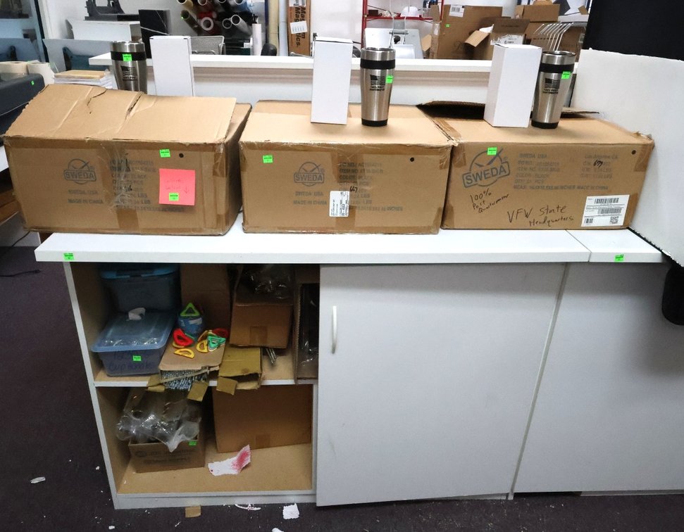 Boxes of Coffee Mugs, Contents of Lower Cabinet(left cabinet)