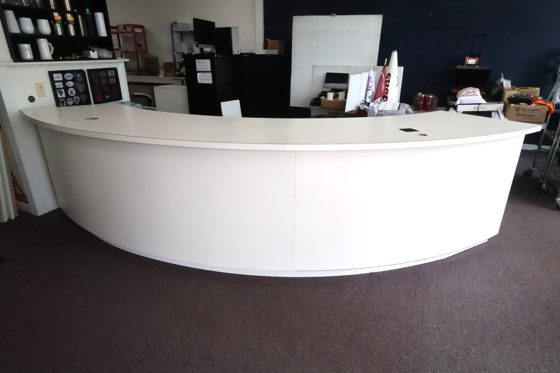 Curved Retail/Reception Counter and contents underneath.