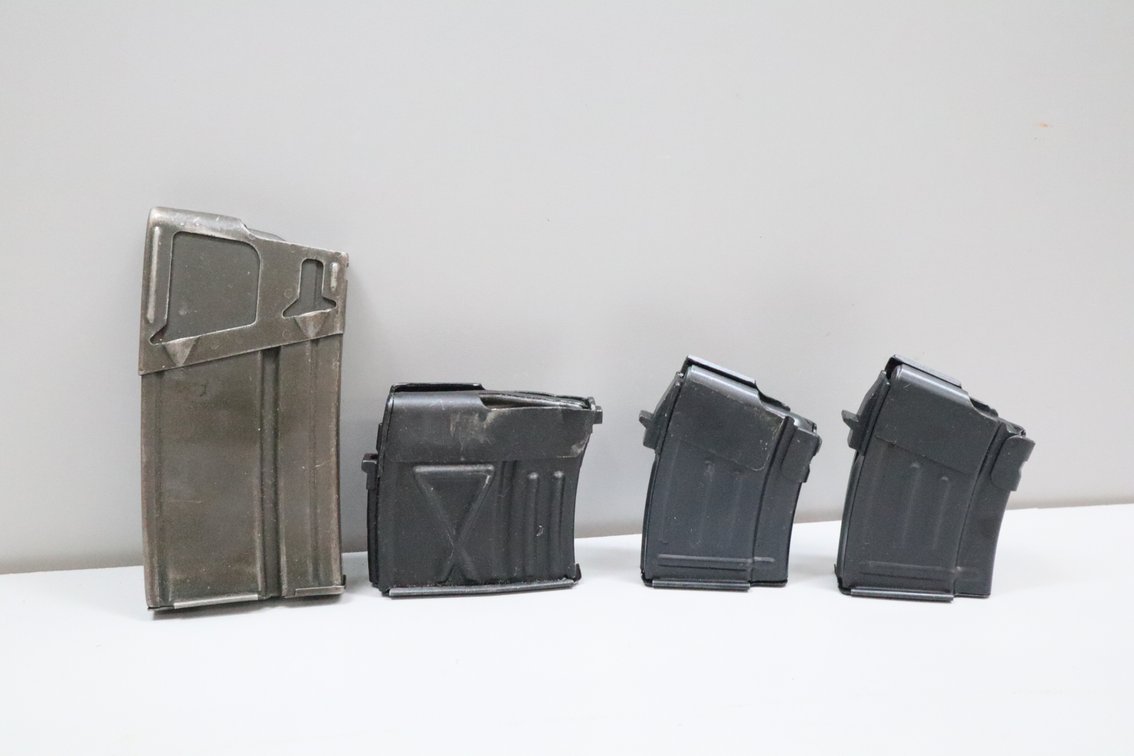 Four Metal Rifle Magazines