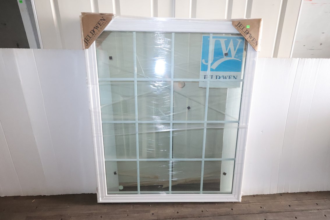 Vinyl fixed window
