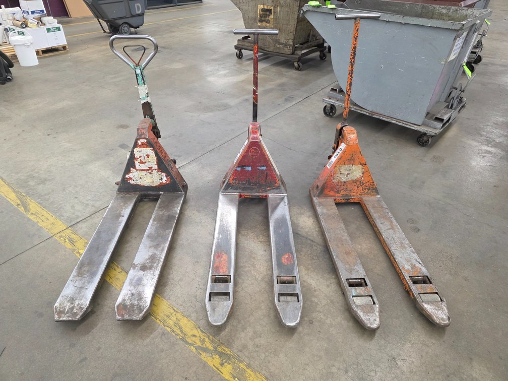 (3) Pallet Jacks.