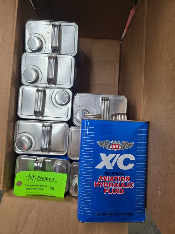 (9) Gallons of Phillips 66 X/C Aviation Hydraulic Fluid.