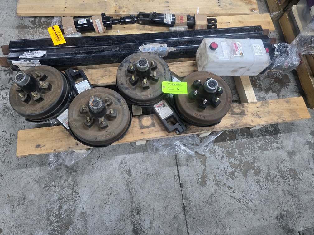 Rockwell American Trailer Axles, Hubs, Hydraulic Pump/Reservior and Hydraulic Cylinders for Lift/Lower Trailer.