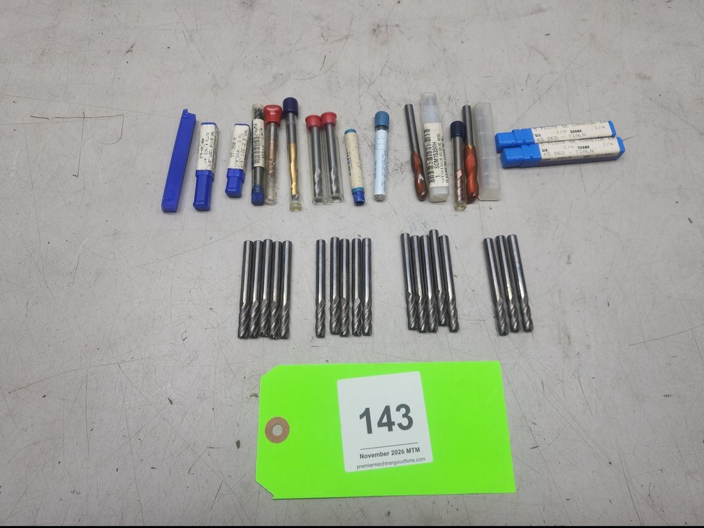 Assorted 1/4" Carbide Endmills.