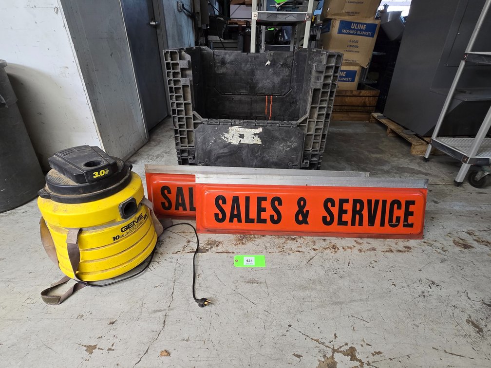 (2) "Sales & Service" Signs Approx. 48" x 13" x 3" and Genie 10 Gallon Wet/Dry Vac.
