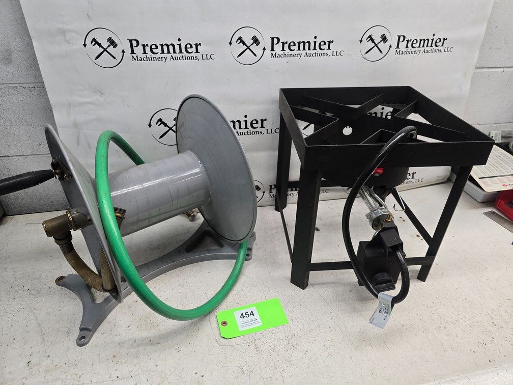 Random Mfg. Model TF2115711-MM-00 Propane Cook8ng Stand and Roughneck Garden Metal Hose Reel.