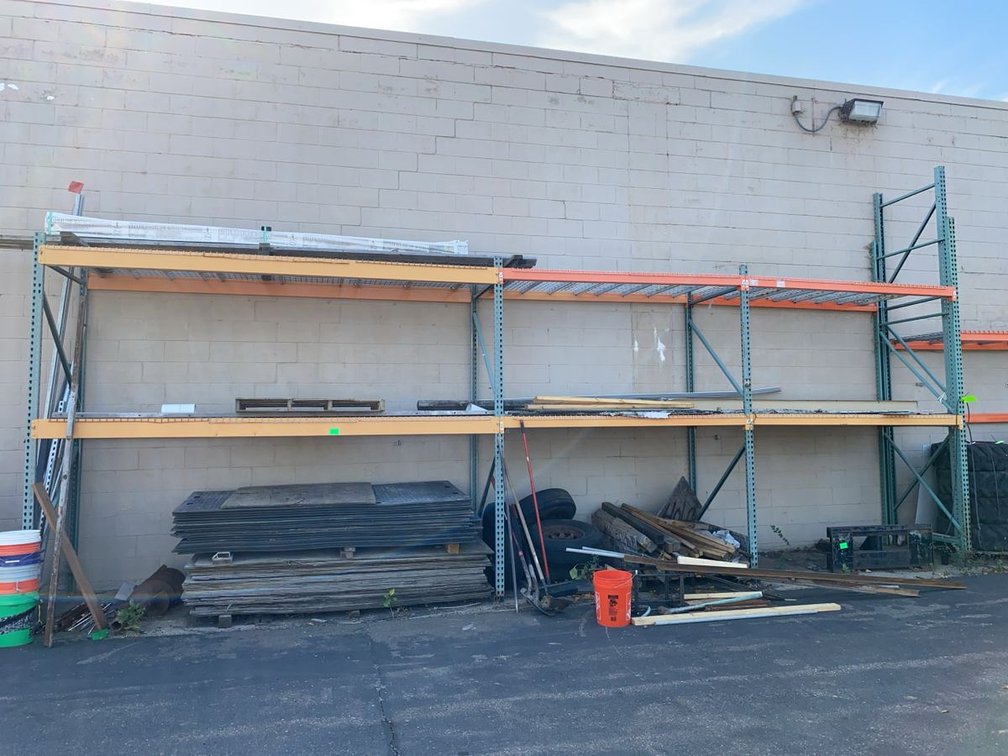 Assortment of Teardrop Pallet Rack Uprights and Crossbeams