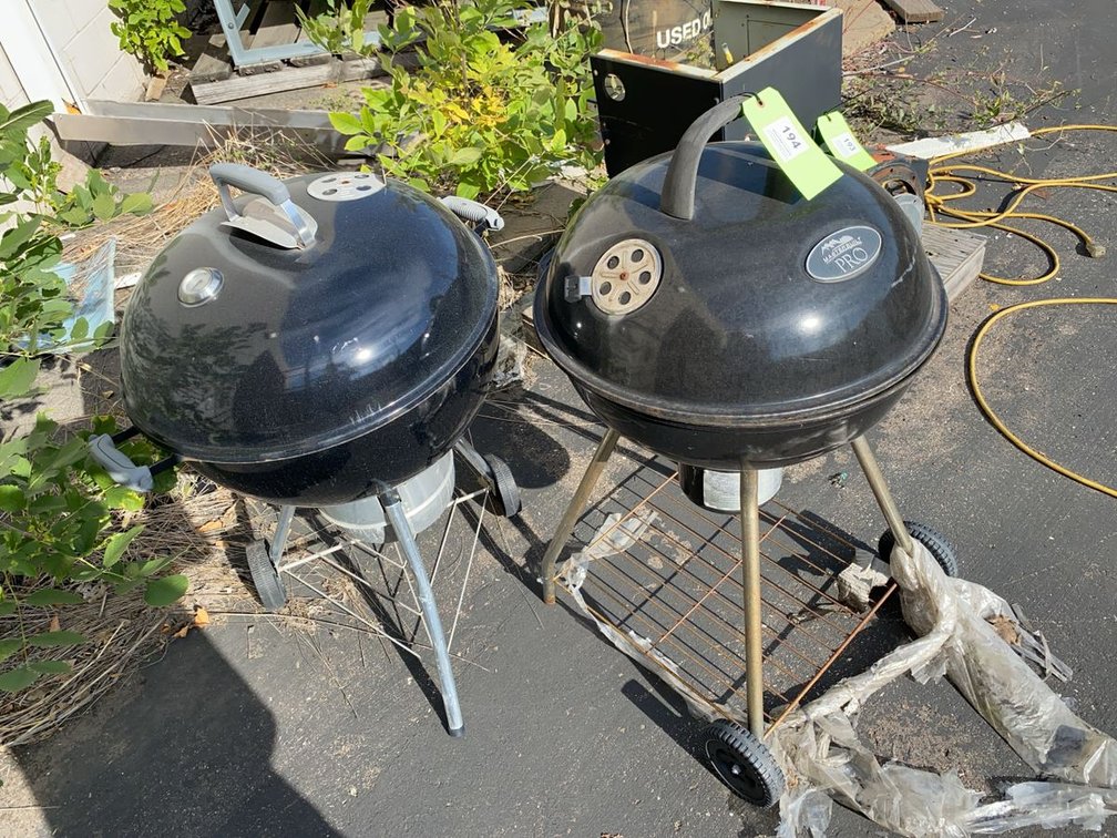 Group of Weber and Masterbuilt Pro Charcoal Grills