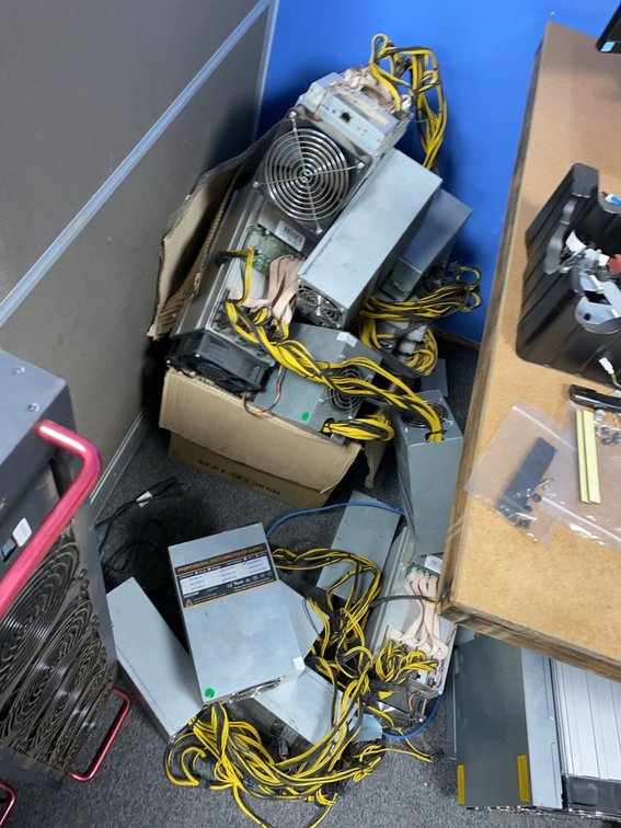 Group of ASIC Bitcoin Miners and Mining Power Supply Units