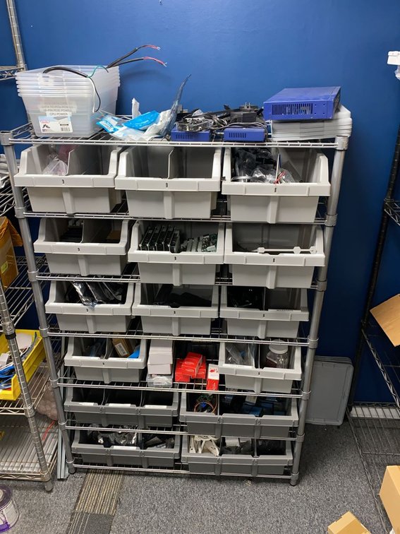 Group of Electronic Component Bins on Wire Rack