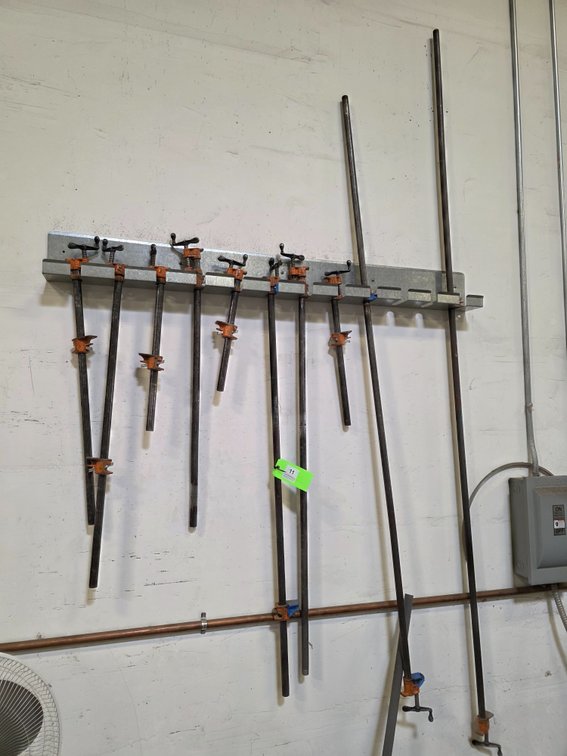 (10) Pipe Clamps with Pony Brand Clamps.