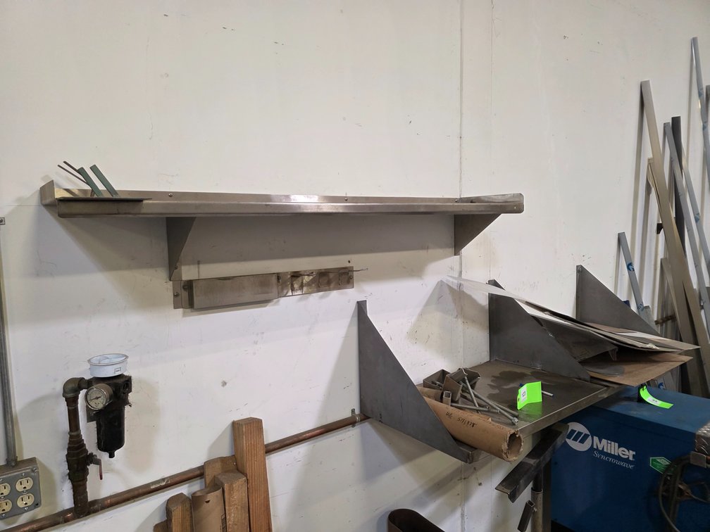 (2) Stainless Steel Wall Mounted Racks.