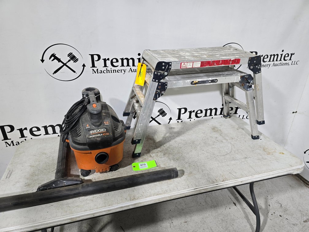 Portable Wet/Dry Vacuum and Folding Aluminum Work Platforms.