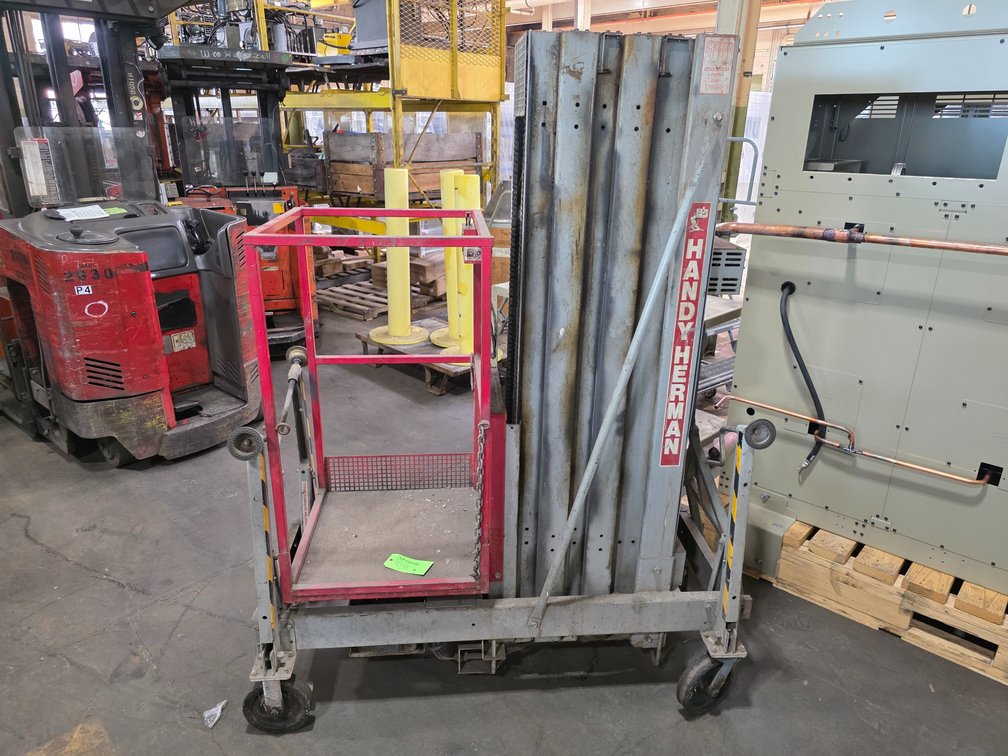 Mayville Engineering Co. Model 24D, "Handy Herman" 24' Electric Man Lift. 