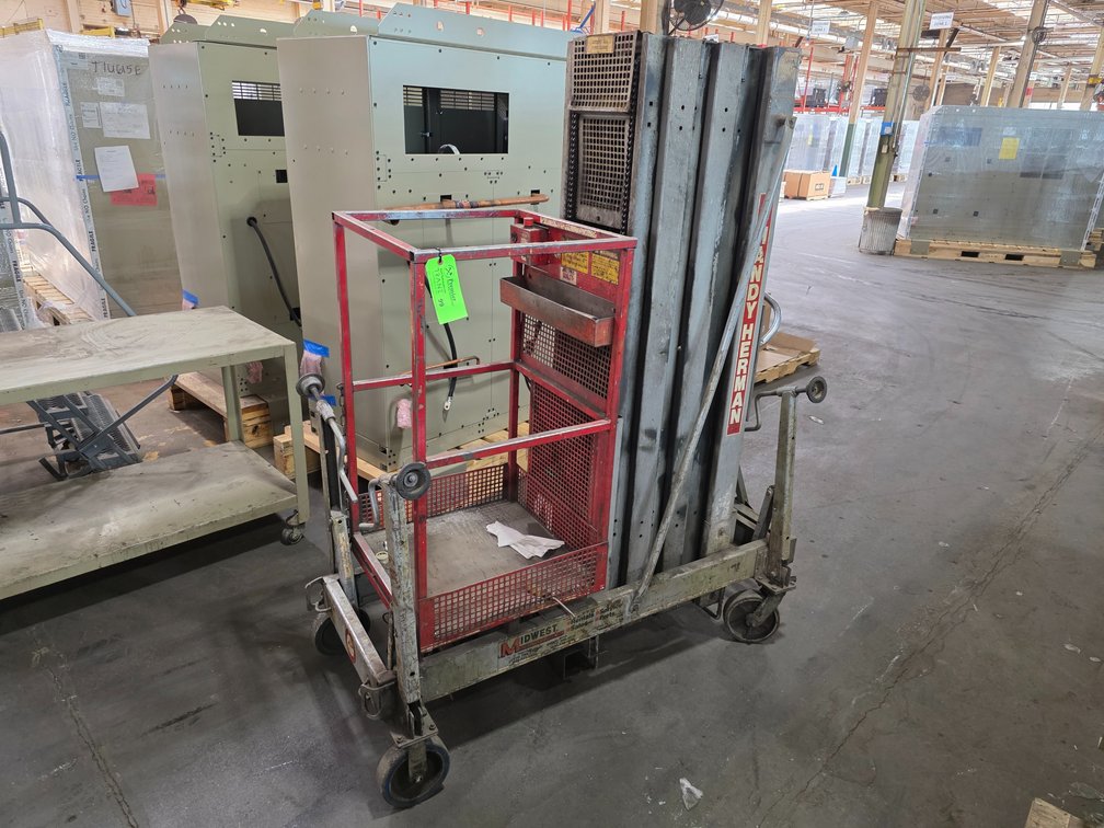 Mayville Engineering Co. Model 24D, "Handy Herman" 24' Electric Man Lift. 