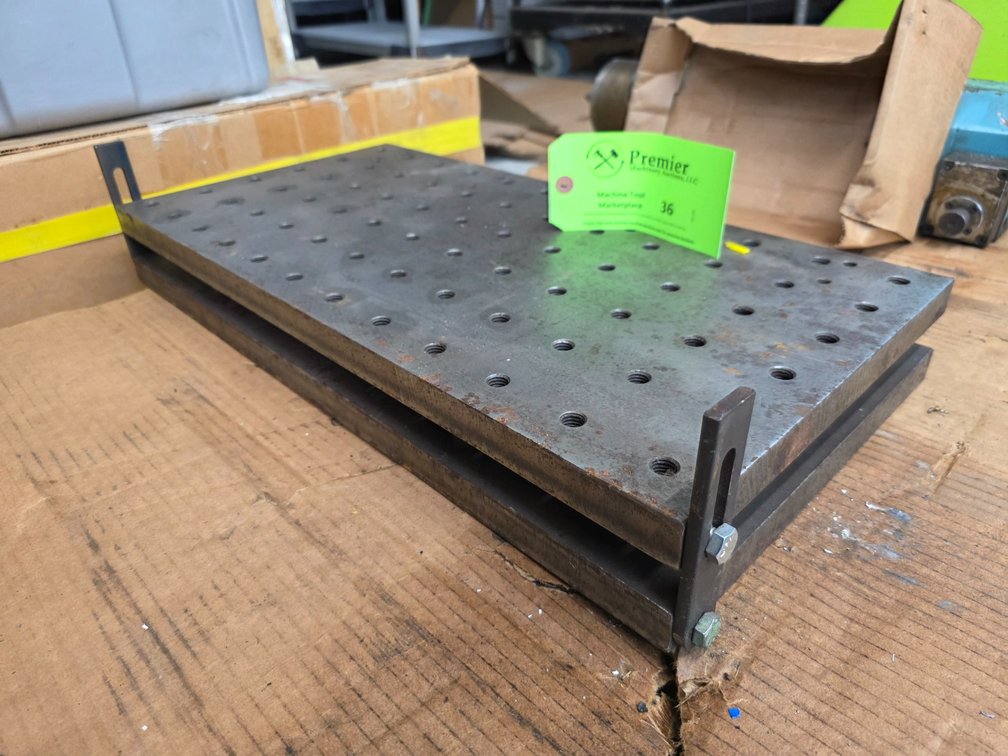 Adjustable Angle Drilled and Tapped Workholding Plate. 