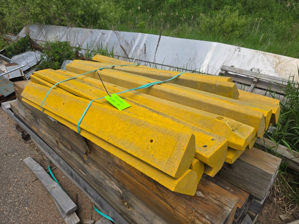 Pallet of Composite Parking Lot Bump Stops.