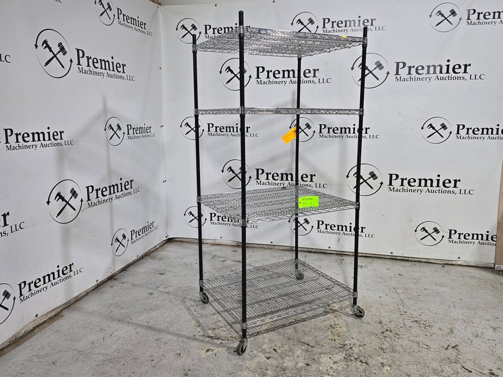 Nextel Industries Metal Rack with Locking Caster Wheels. 