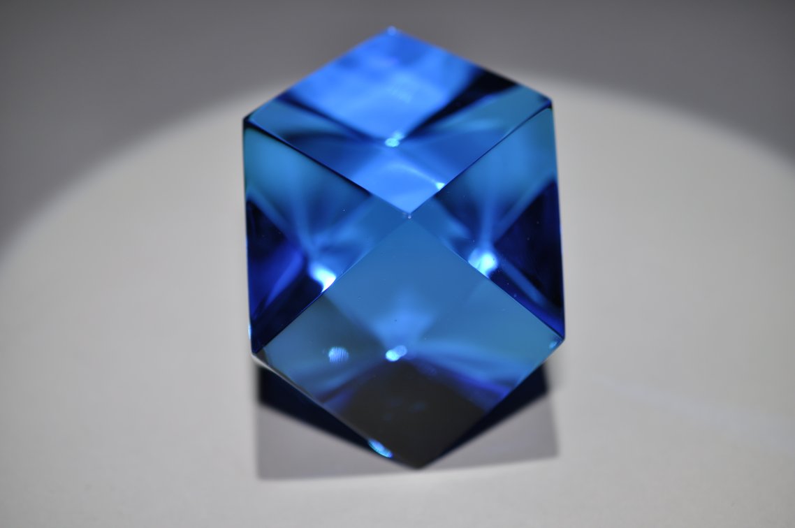 Two Faceted Blue Glass Paperweights