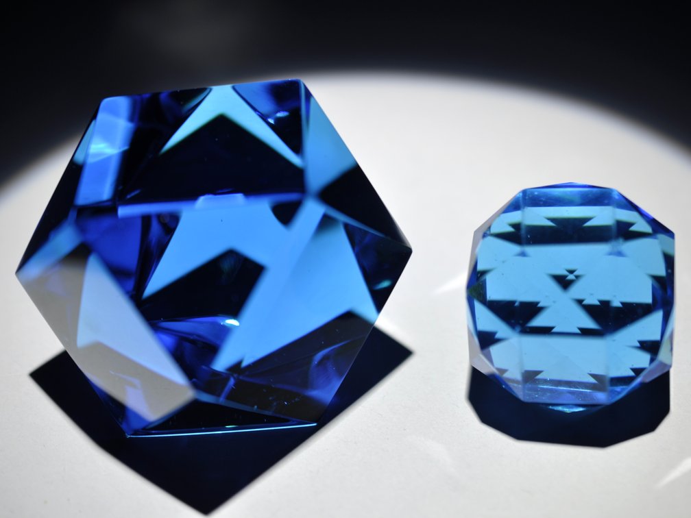 Two Faceted Blue Glass Paperweights