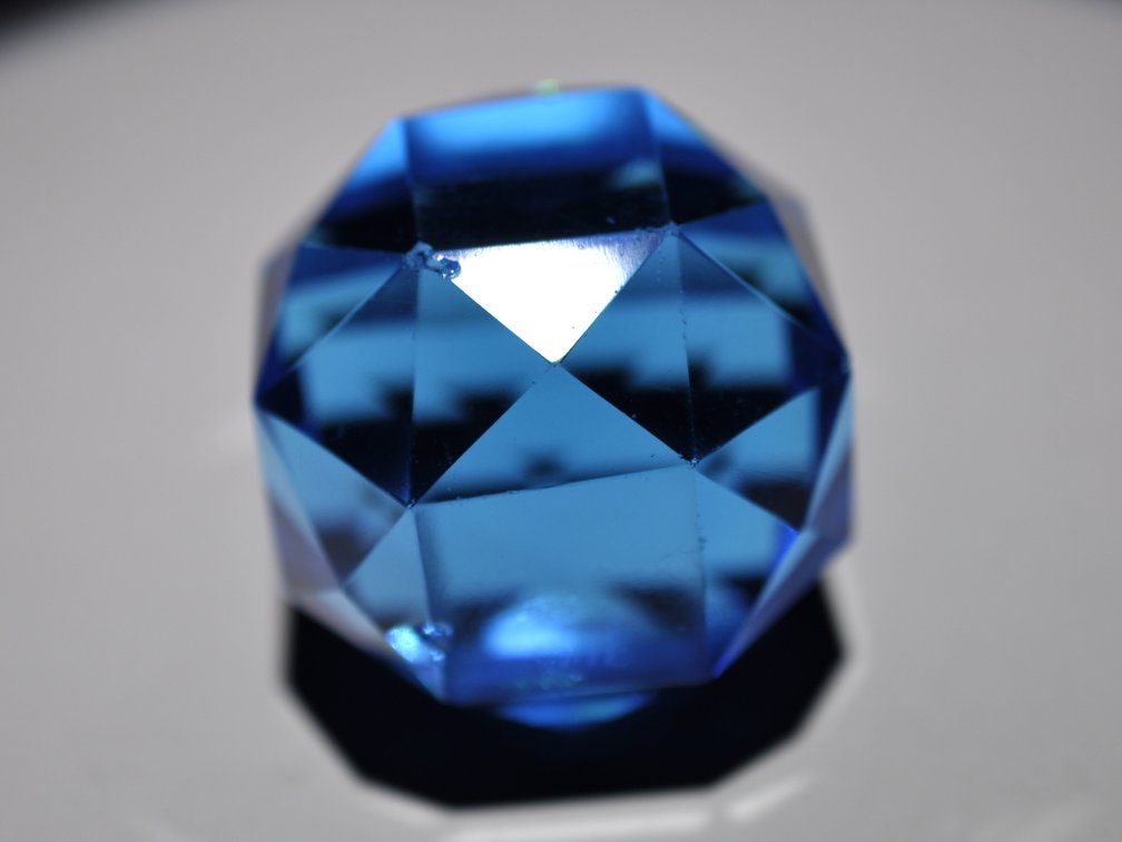 Two Faceted Blue Glass Paperweights