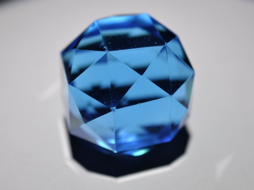 Two Faceted Blue Glass Paperweights