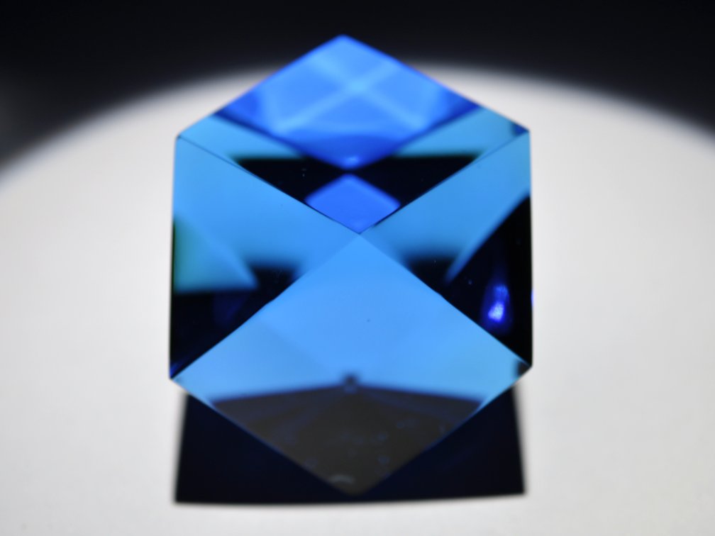 Two Faceted Blue Glass Paperweights