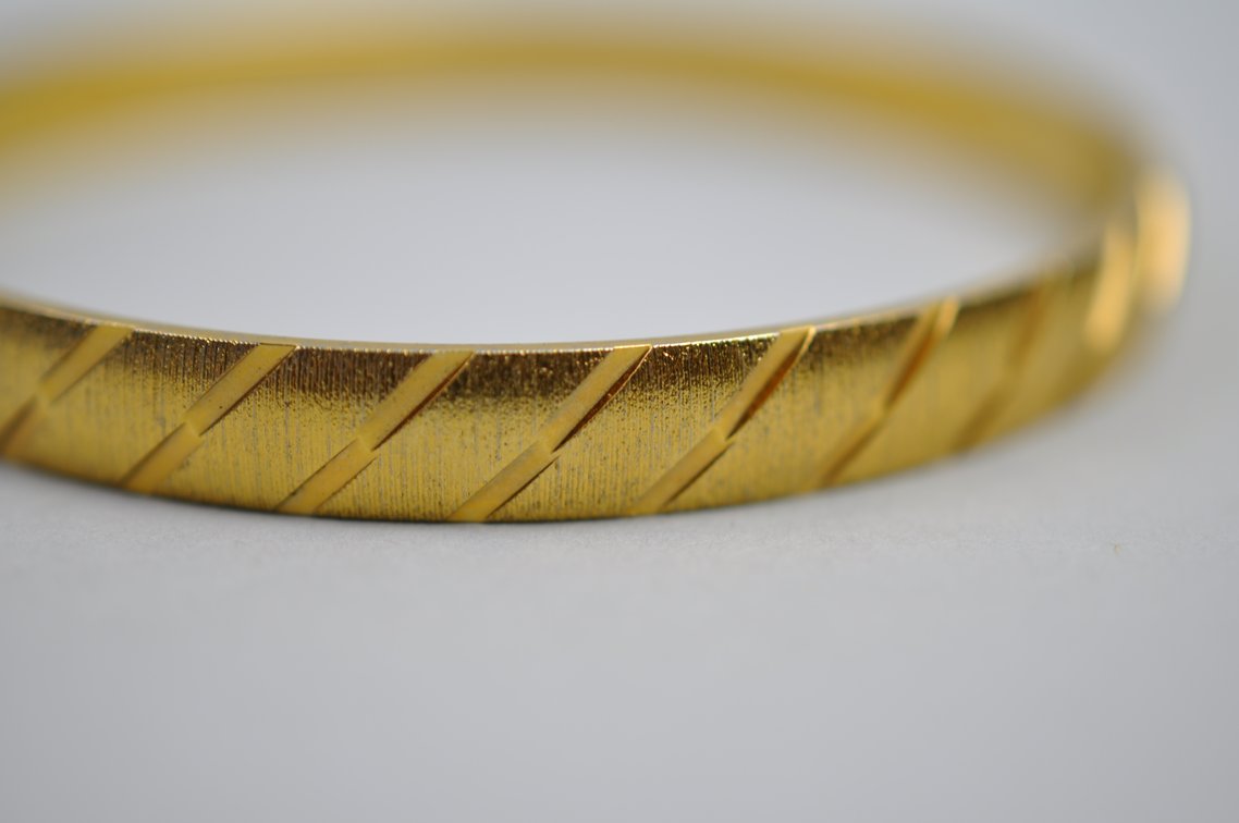 Collection of Bangles and Monet Pin