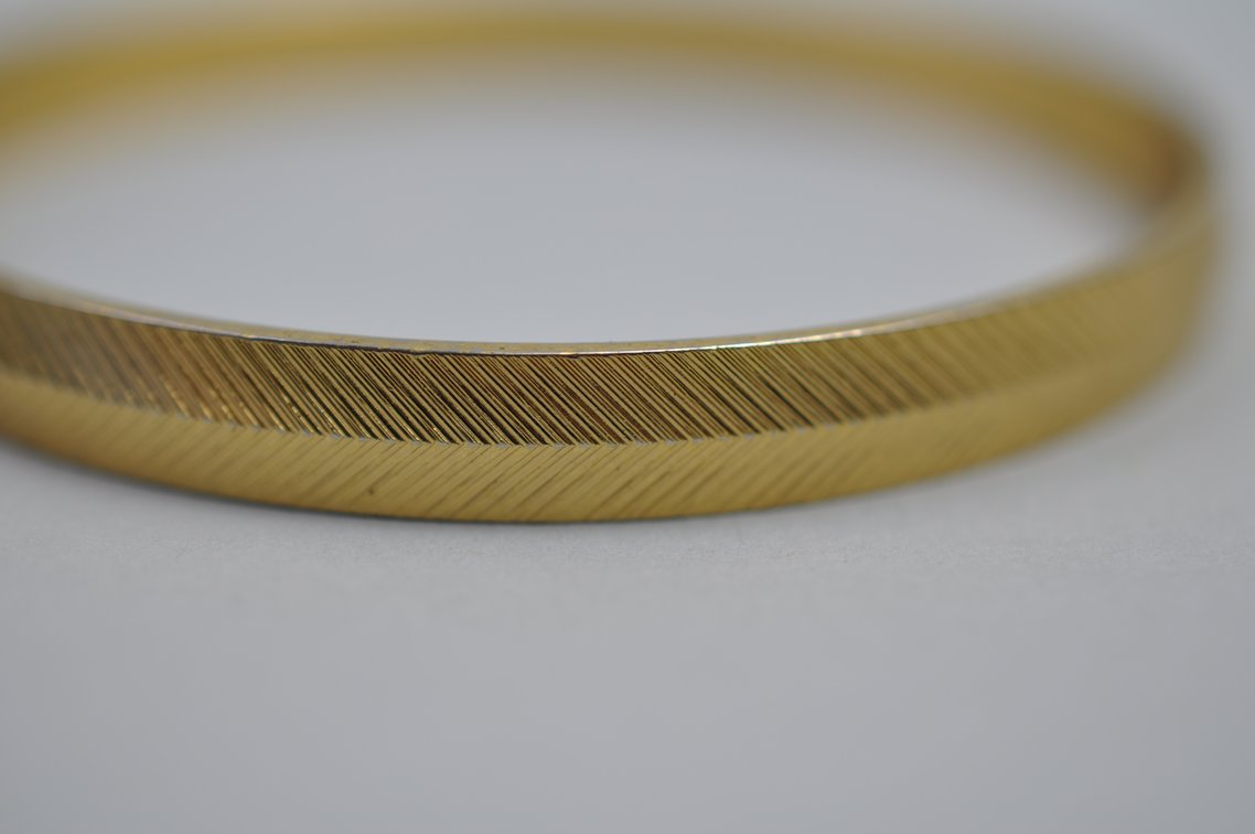Collection of Bangles and Monet Pin