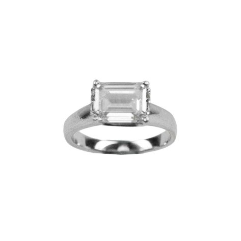 An elegant emerald cut four prong solitaire ring