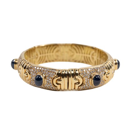 An 18k yellow gold bracelet with 6 oval cabochon sapphire and 397 small brilliant cut diamonds
