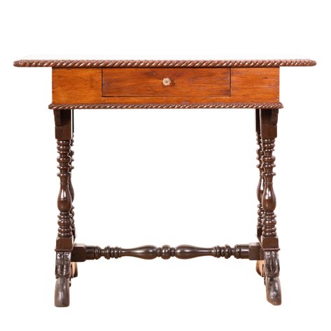 A Renaissance Revival pebetera (sewing table) with acanthus openwork trestle base, and outstanding gadrooning and turnings