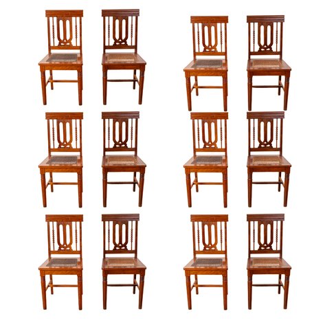 A set of 12 Victorian style side chairs with vase-shaped and bead turning splat