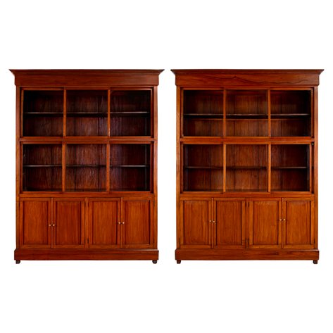 A pair of early American period botica (apothecary) cabinets