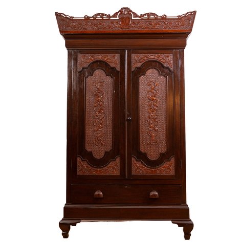 An eclectic Rococo Revival aparador (armoire) featuring finely carved monogram crest and Estilo Tampinco Art Nouveau panels