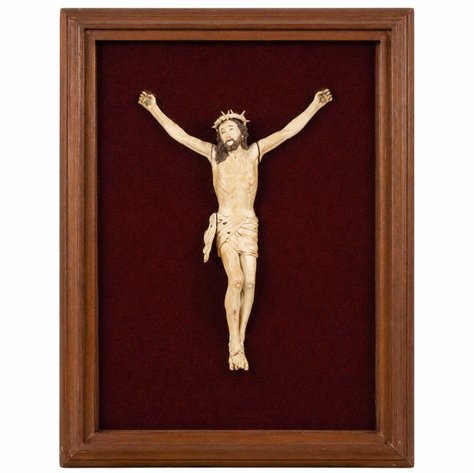 An exquisite Sino-Philippine ivory Corpus Christi in a frame