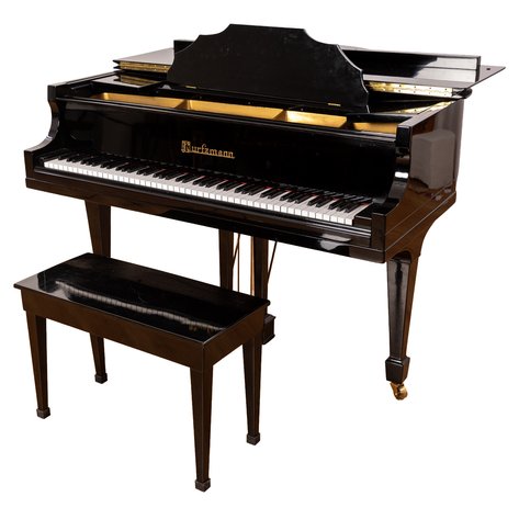 C. Kurtzmann & Co - A polished ebony grand piano with bench