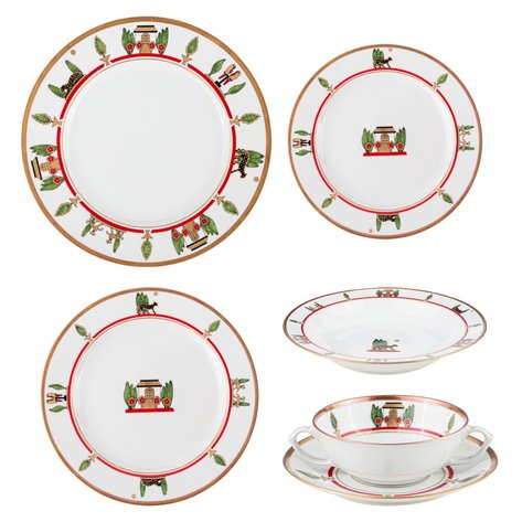 Cartier - A 'La Maison de Louis Cartier' Limoges porcelain set consisting of a chop platter, a dinner plate, a salad / dessert plate, a wide rim soup bowl, and a pair of soup bowls and saucers