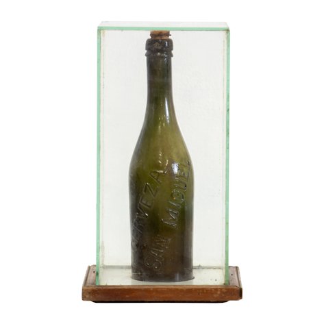 An antique glass bottle of Cerveza de San Miguel