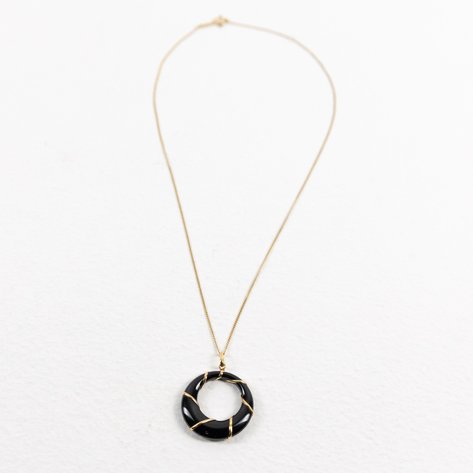 A black onyx 'door knocker' necklace in 18k gold