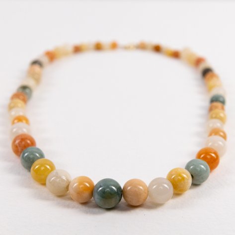 A multicolored jade gemstone beaded necklace with 14k yellow gold clasp
